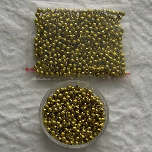 Lot de perles rondes 3 mm. couleur or 