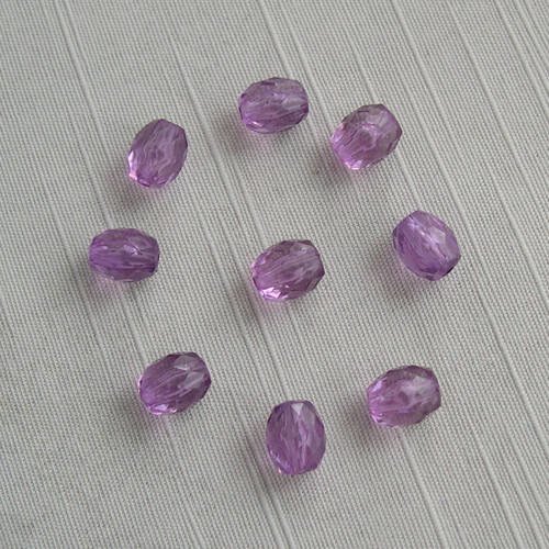 Lot de 9 perles transparentes à facette 10 x14 mm. 