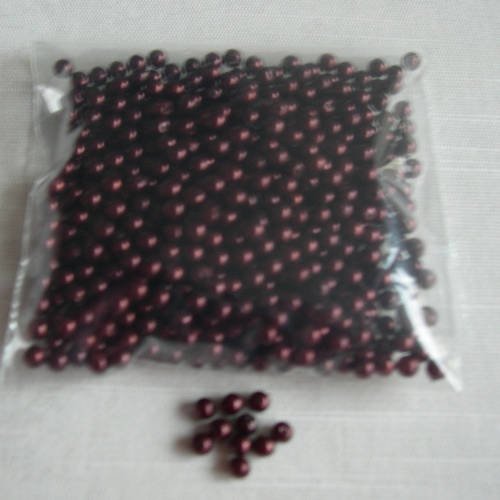 Lot de petites perles synthétiques marron 4 mm. 
