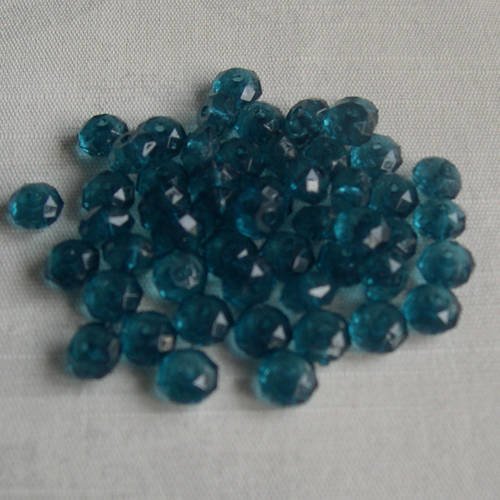 Lot de 10 perles synthétiques transparentes a facette 9x5 mm. 
