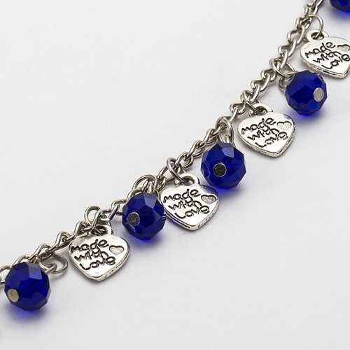 Chaine en metal argentée avec perles en verre bleu royal et breloques tibetaine (1 mètre)