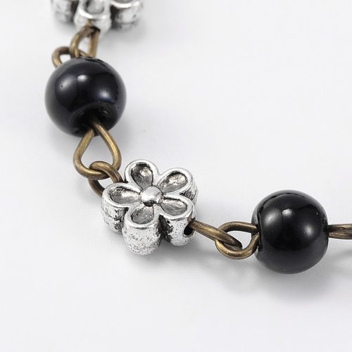 Chaine en métal bronze avec perles en verre noir et fleur métal(1m)