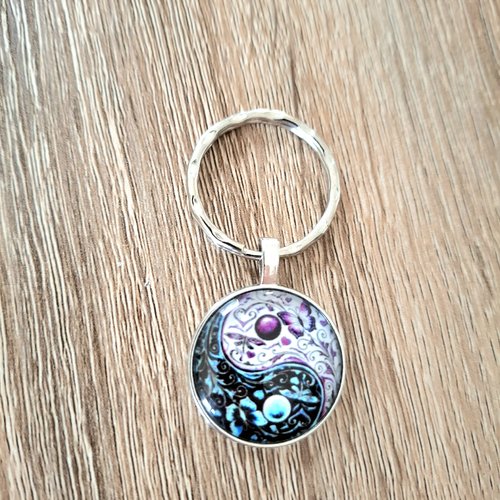 Porte-clés ying yang fleuri bleu et violet