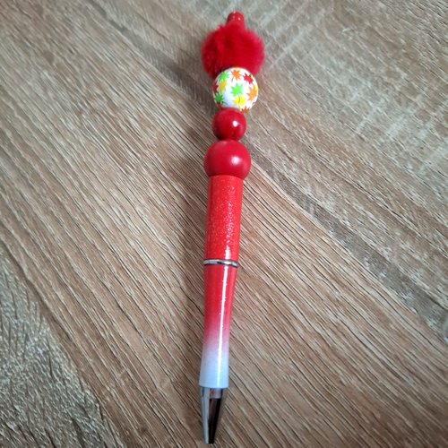 Stylo rouge et blanc froufrou
