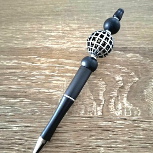 Stylo noir perle cage argentee