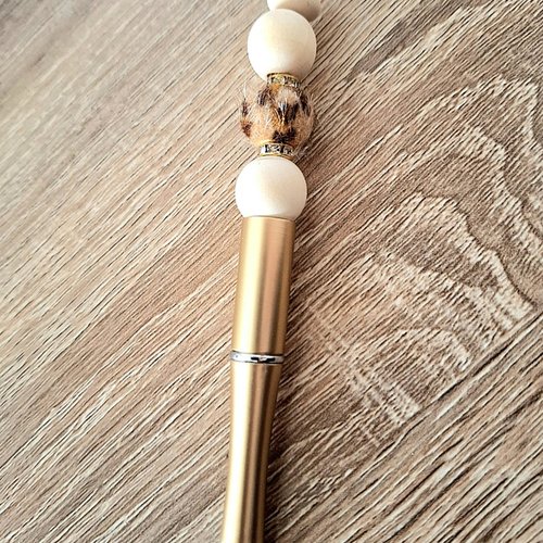 Stylo fourrure doré et noir