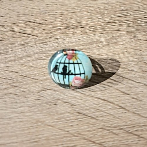 Bague réglable cabochon oiseau en cage