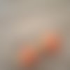 Boucles d'oreilles pendantes perles tricot orange et vert