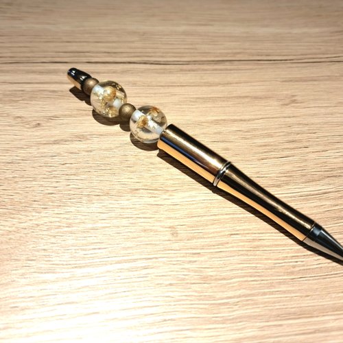 Stylo doré perles transparentes