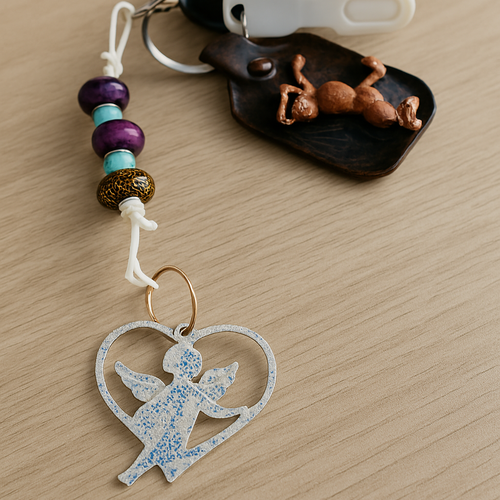 Porte clef cupidon bleu pailleté