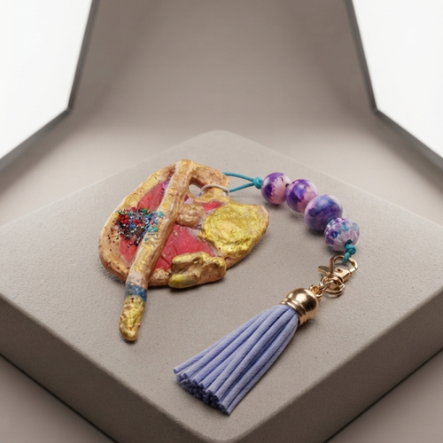Bijou de sac "l'âme d'artiste" – palette & pinceau dorés