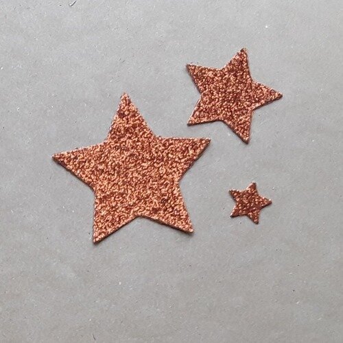 Lot de 3 découpes étoiles cuivrées en papier pailleté 