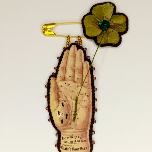 Broche "ligne de chance"