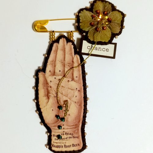 Broche "ligne de chance"