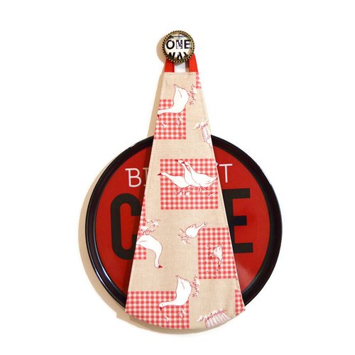 Range plateau mural rond motifs petites oies