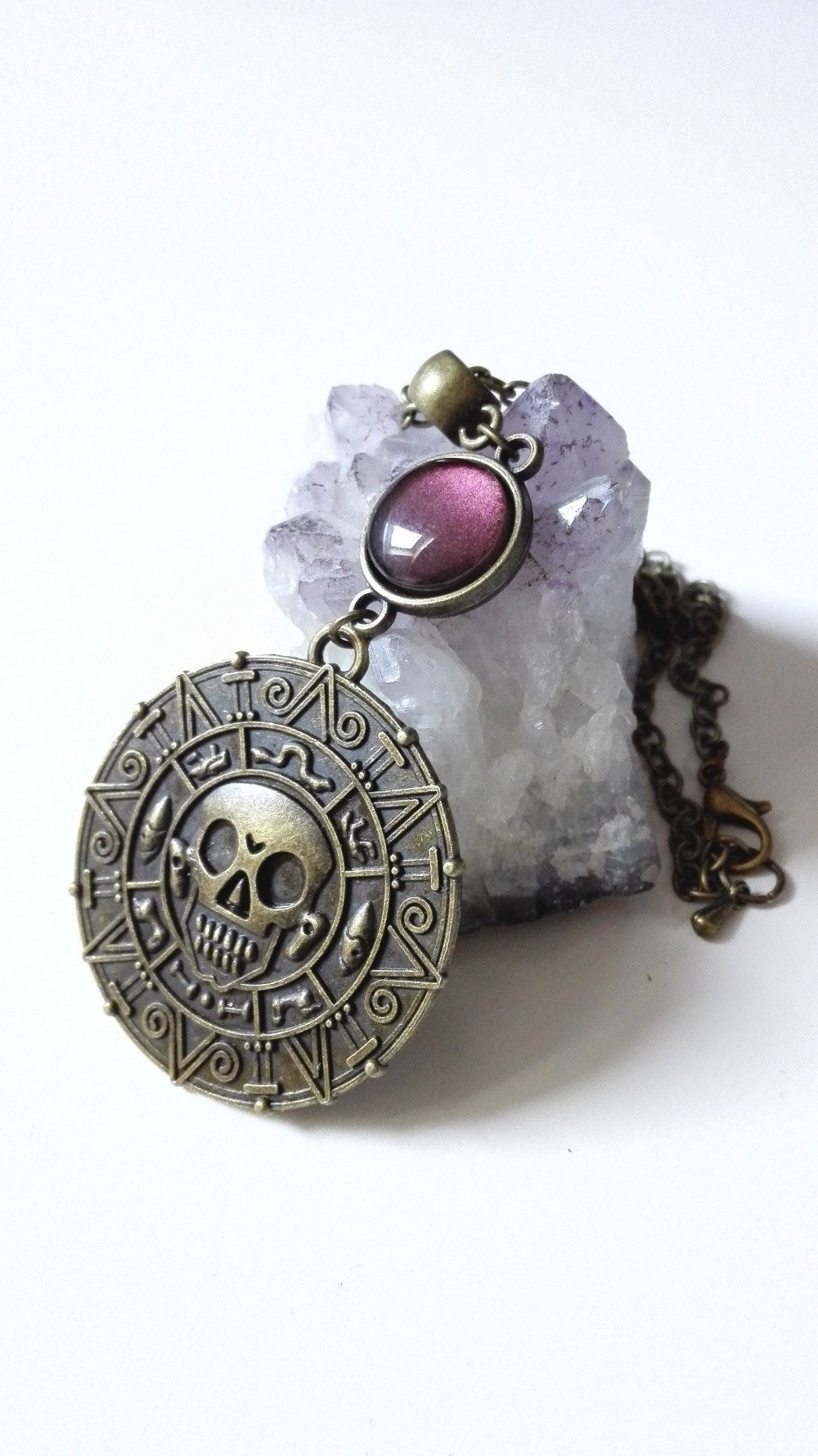 Collier pirates des caraibes pièce de huit bronze bordeaux jack sparow Un grand marché