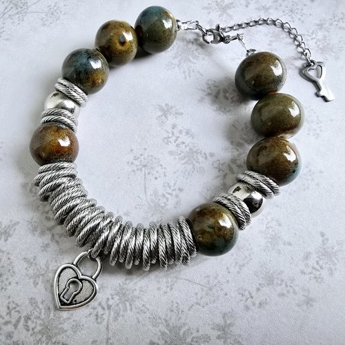 Bracelet femme ajustable style ethnique perle marron céramique porcelaine multiple anneaux striés argentés acier inoxydable breloque