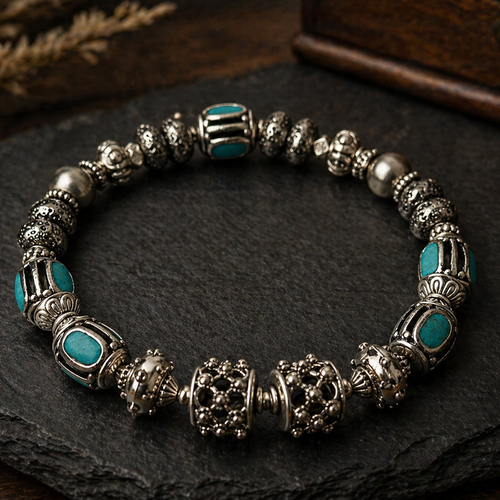 Bracelet homme élastique couleur argent argentée breloque perle grise pierre de lave perle métal turquoise indonésienne indienne