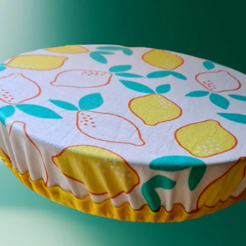 Couvre-plat ou grand saladier lavable et réutilisable en coton enduit | fabrication artisanale | citron jaune | avec biais jaune