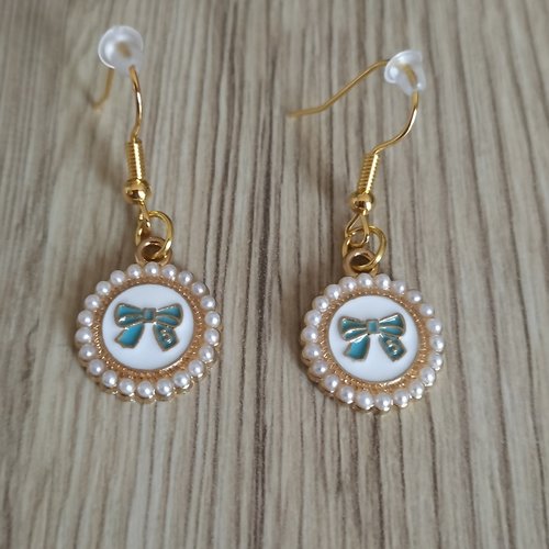 Boucles d'oreilles médailles noeuds