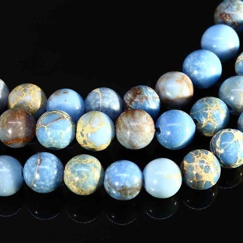 20 perles de régalite bleu turquoise claire 6mm ronde