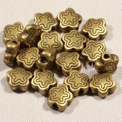 20 mini perles intercalaires mini plate étoile bronze 7mm
