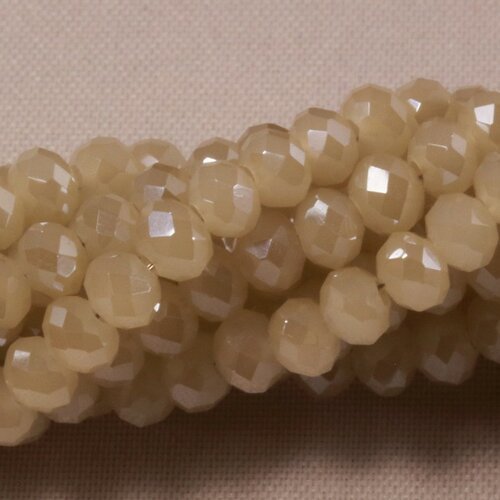 Lot de 50 perles boulier en verre facettée sable grège 4x3mm
