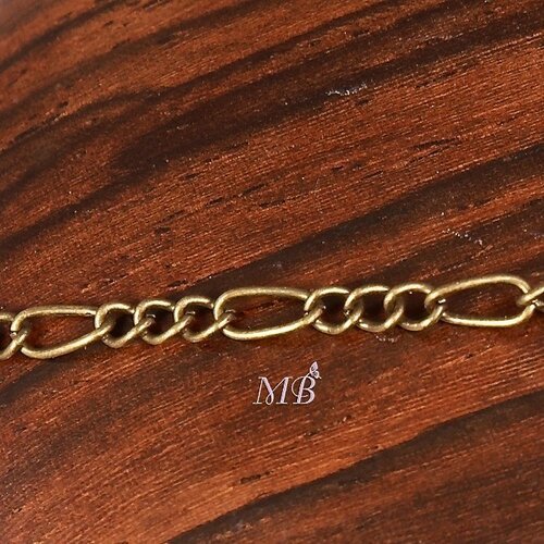 1 mètre chsm029y  chaine deux maillons 3x6mm et 2,5x3,5mm  couleur bronze ovale