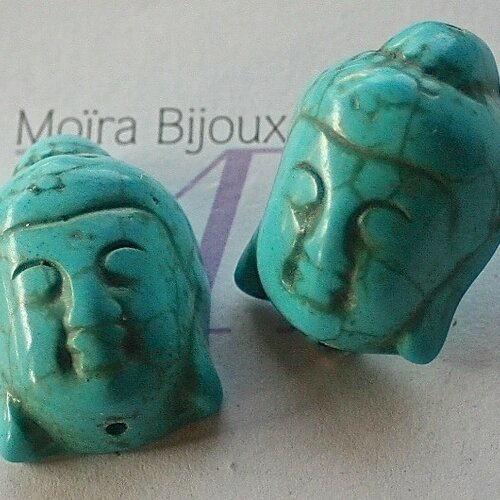 2 perles têtes  de bouddha en turquoise teintée en relief 29x20mm