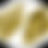 10 breloques coquillage dorés avec effet relief 25,5x13mm