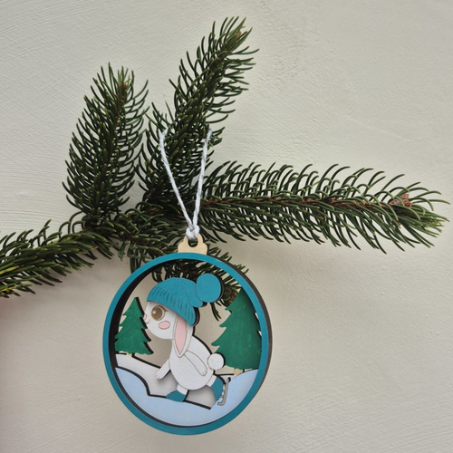 Décoration de noël en bois lapin patineur