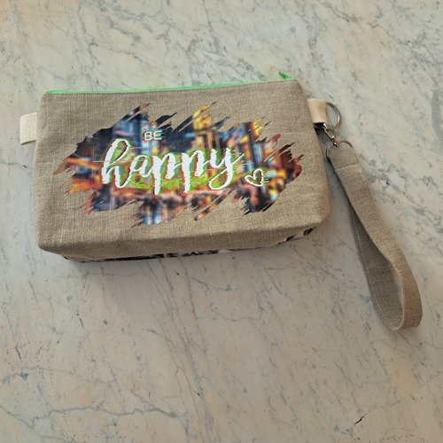 Trousse en lin et coton avec l'inscription "be happy"