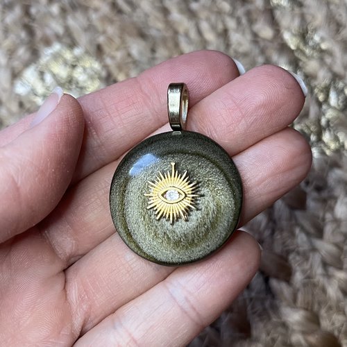 Pendentif talisman obsidienne dorée