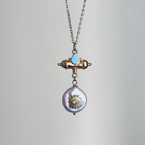 Collier grigri perle d’eau douce