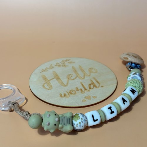 Attache tétine dinho