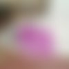 Boucles d'oreilles plumes rose fuchsia sur 3 chaînettes et connecteur soleil couleur argent