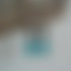 Boucles d'oreilles perle de verre à facettes goutte turquoise bleu canard et perle rondelle noire sur crochet argenté