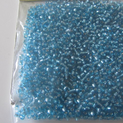 Sachet de 24 grammes de  perles de cristal  (rocaille)  bleues - rondes - 1 mm