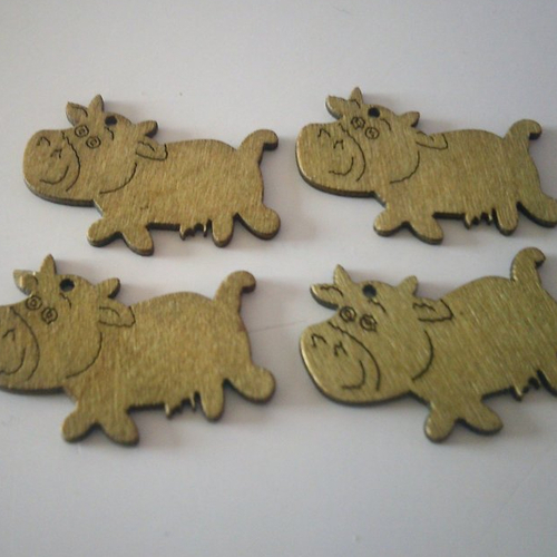Lot de 4 pendentifs - bijou, breloques en bois - représentant des vaches or