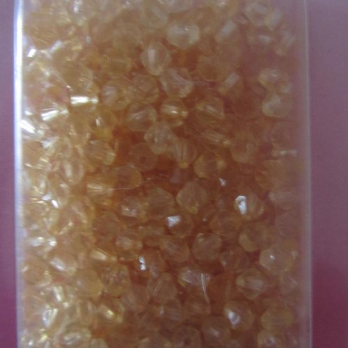 Boîte de 27 grammes de perles de rocaille à facettes de couleur jaune orangé