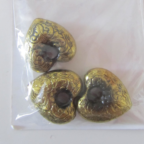 Lot de 3 grosses perles en plastique métallisée couleur or avec arabesques