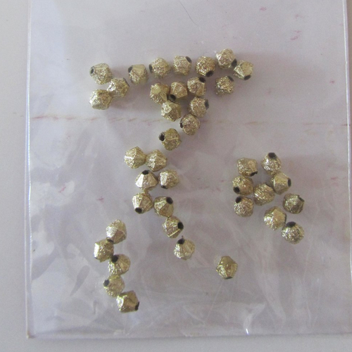 Lot de 40 perles  toupies en plastique métallisée - de couleur dorée - 3 mm