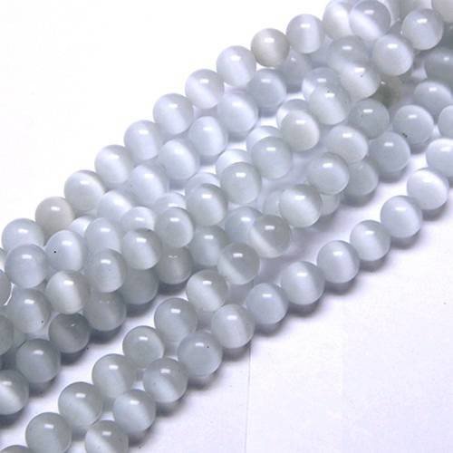 X30 perles en verre,  oeil de chat blanches de 06mm 