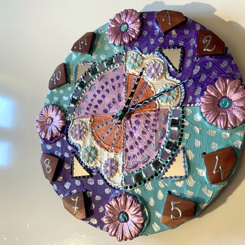 Horloge  unique" fleurs mauves" diam 30 cm- art mural