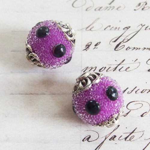 Deux perles ethniques indonésiennes kashmiri violet et noir