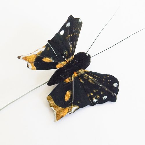 Papillon monté sur tige pour décoration - noir et jaune