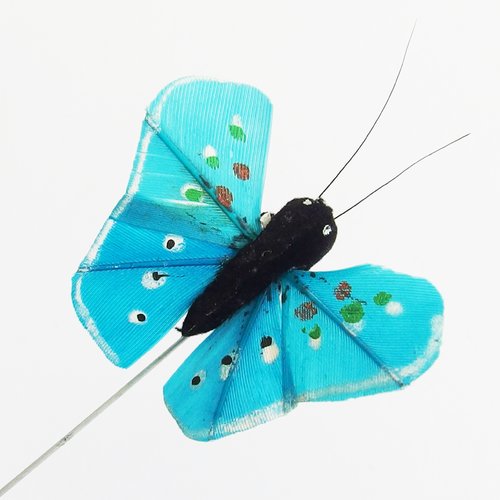 Papillon monté sur tige pour décoration - bleu turquoise