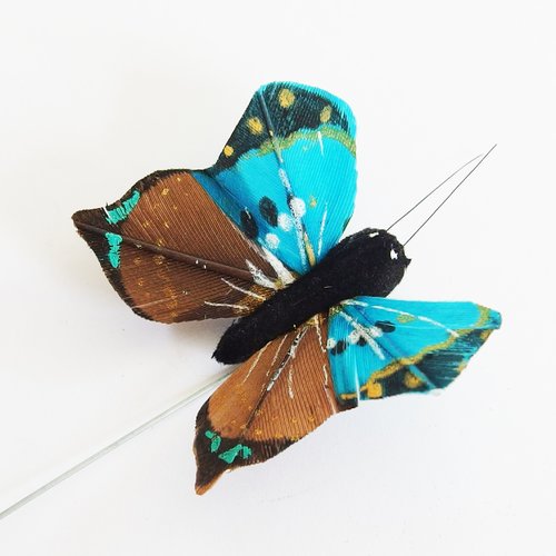 Papillon monté sur tige pour décoration - bleu marron