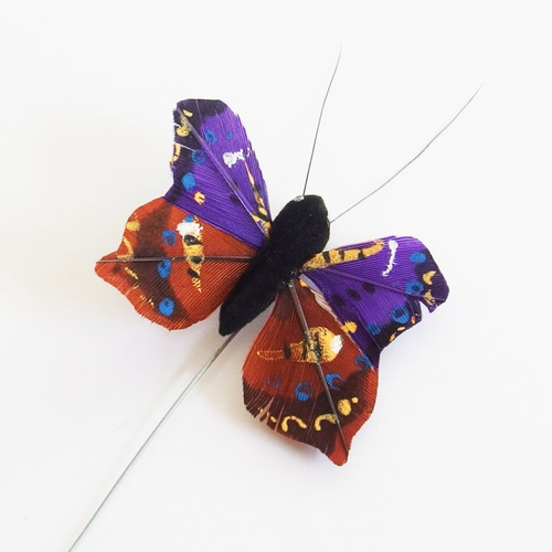 Papillon monté sur tige pour décoration - violet marron