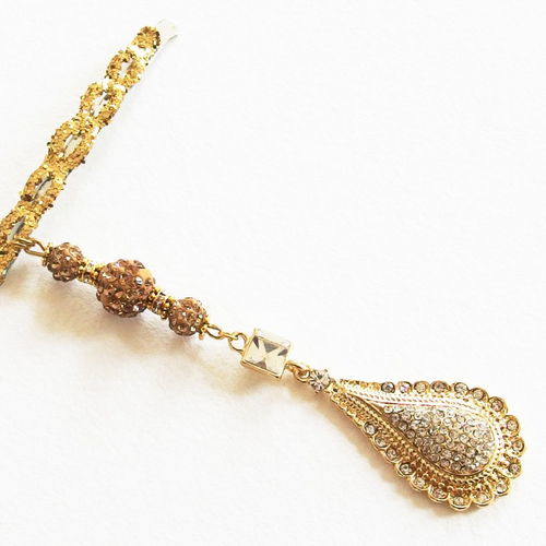 Bijou de cheveux pince strass et or